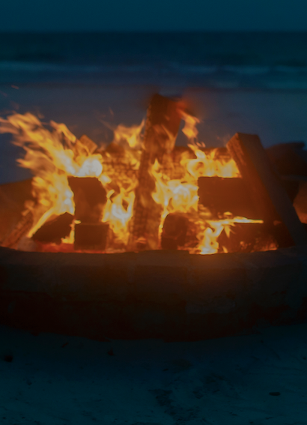 people relaxing and having chat each others in a tent at nomade Tulum