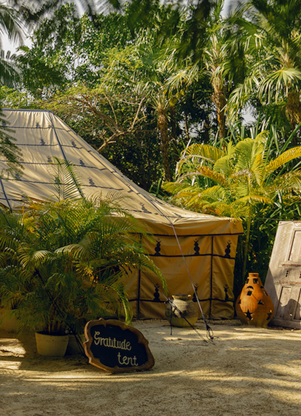 person relaxing and  doing spiritual yoga at nomade Tulum