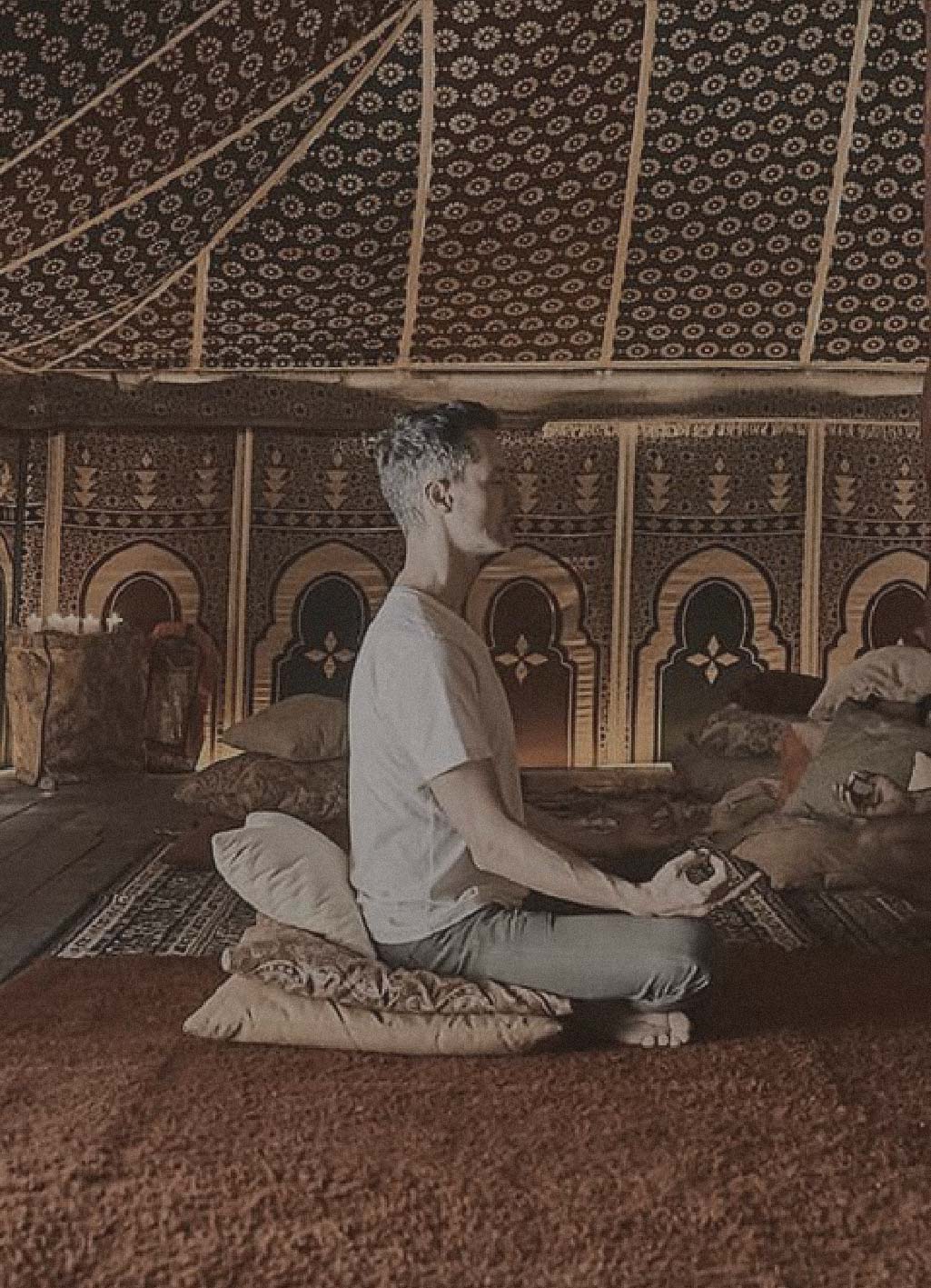 person relaxing and  doing spiritual yoga at nomade Tulum