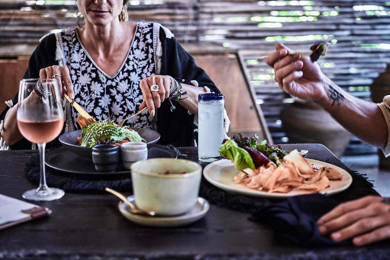 people eating in the restaurant at nomade boutique Hotel Tulum
