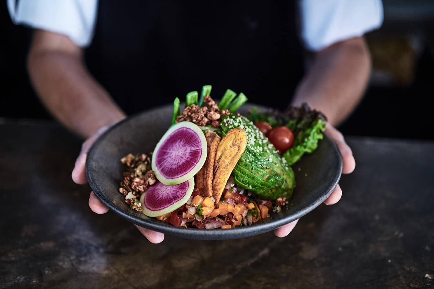 amazing taste dish with avocado in the restaurant at nomade Tulum 