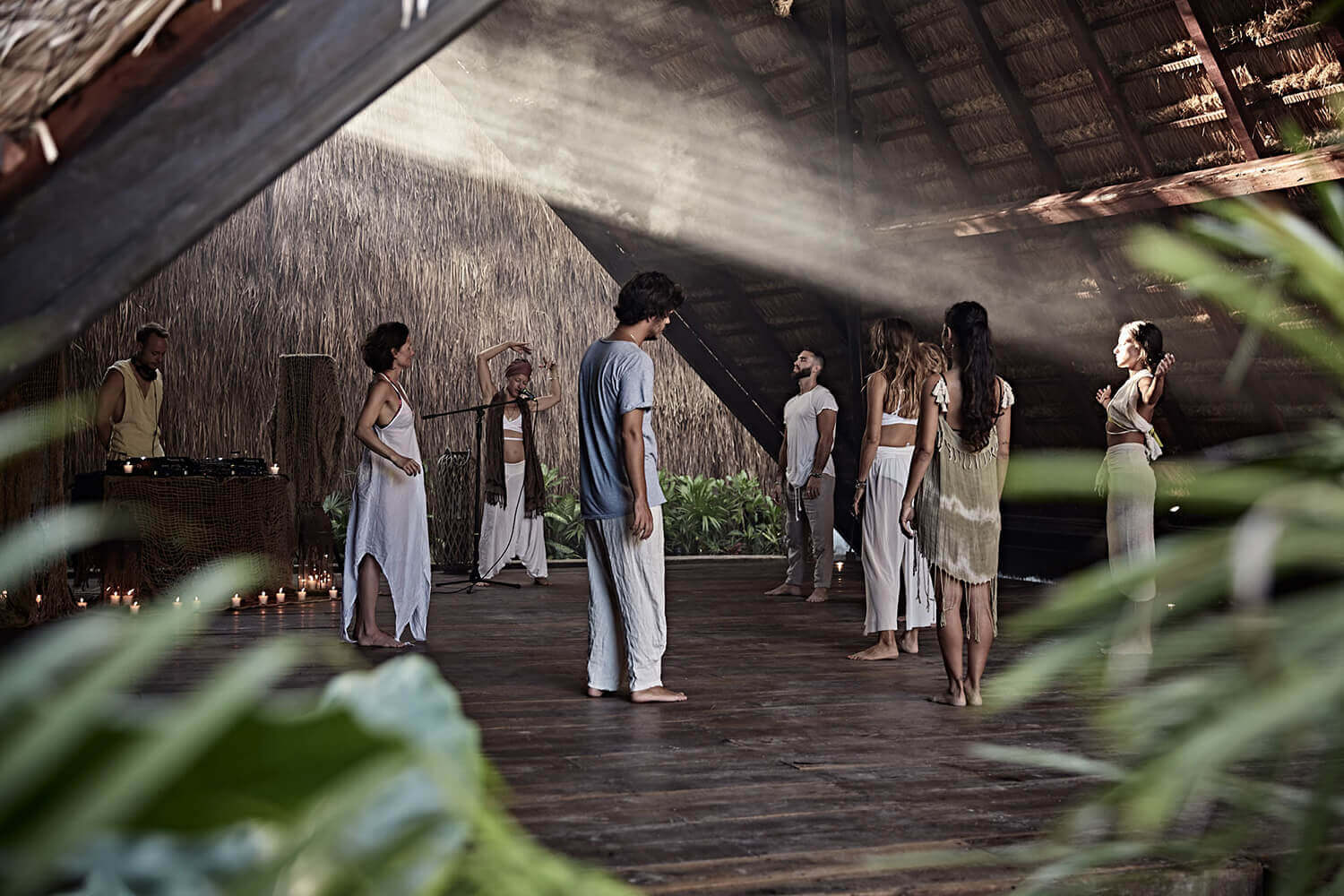 group of people starting a rave spiritual ceremony at nomade Tulum